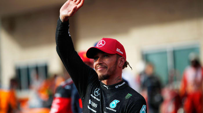Mercedes driver Lewis Hamilton waves to the crowd at the U.S. Grand Prix.